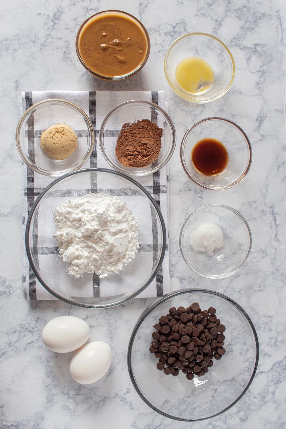 All ingredients for these keto double chocolate chip cookies laid out on the counter